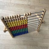 Vintage abacus in wood and primary colors