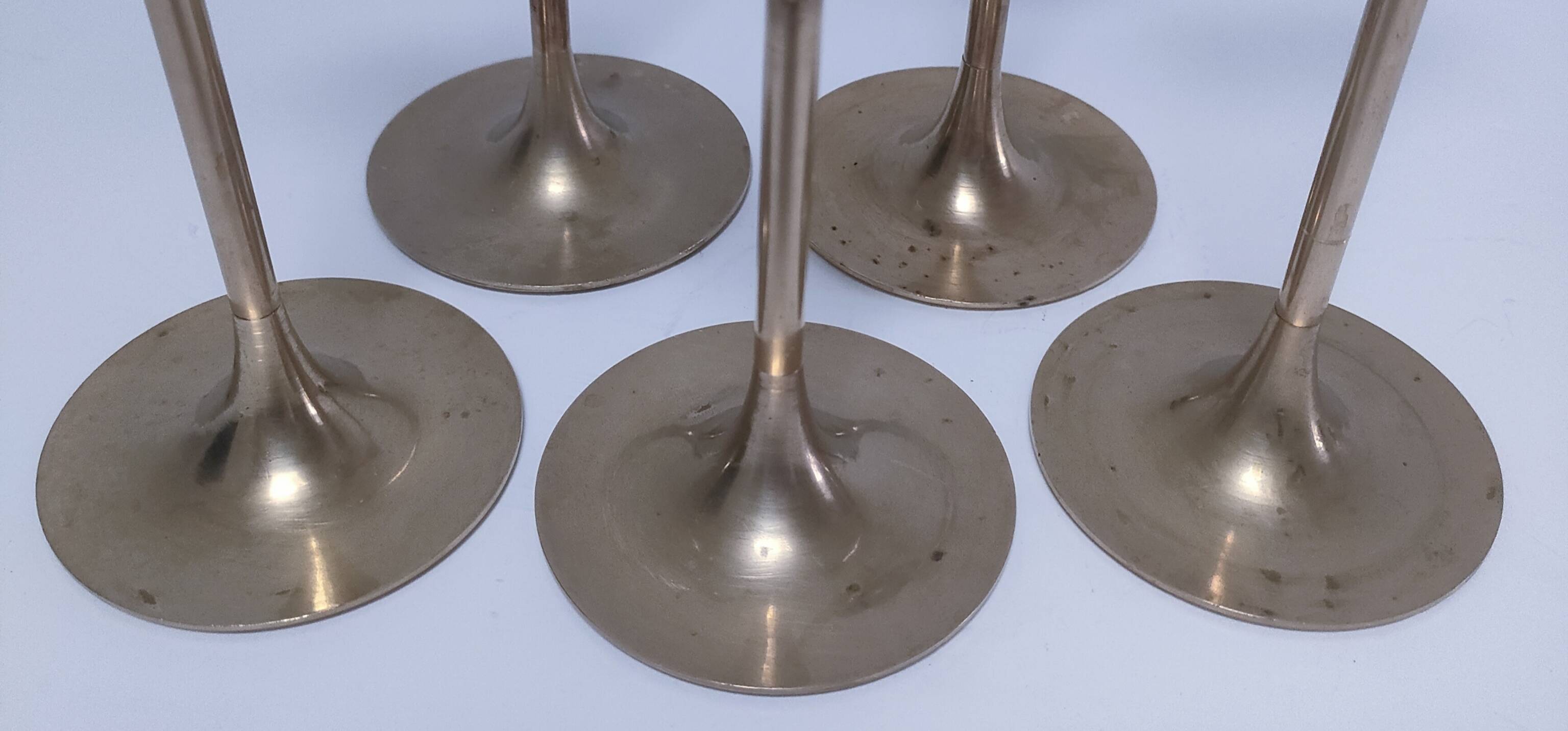 Five vintage Scandinavian design brass candlesticks