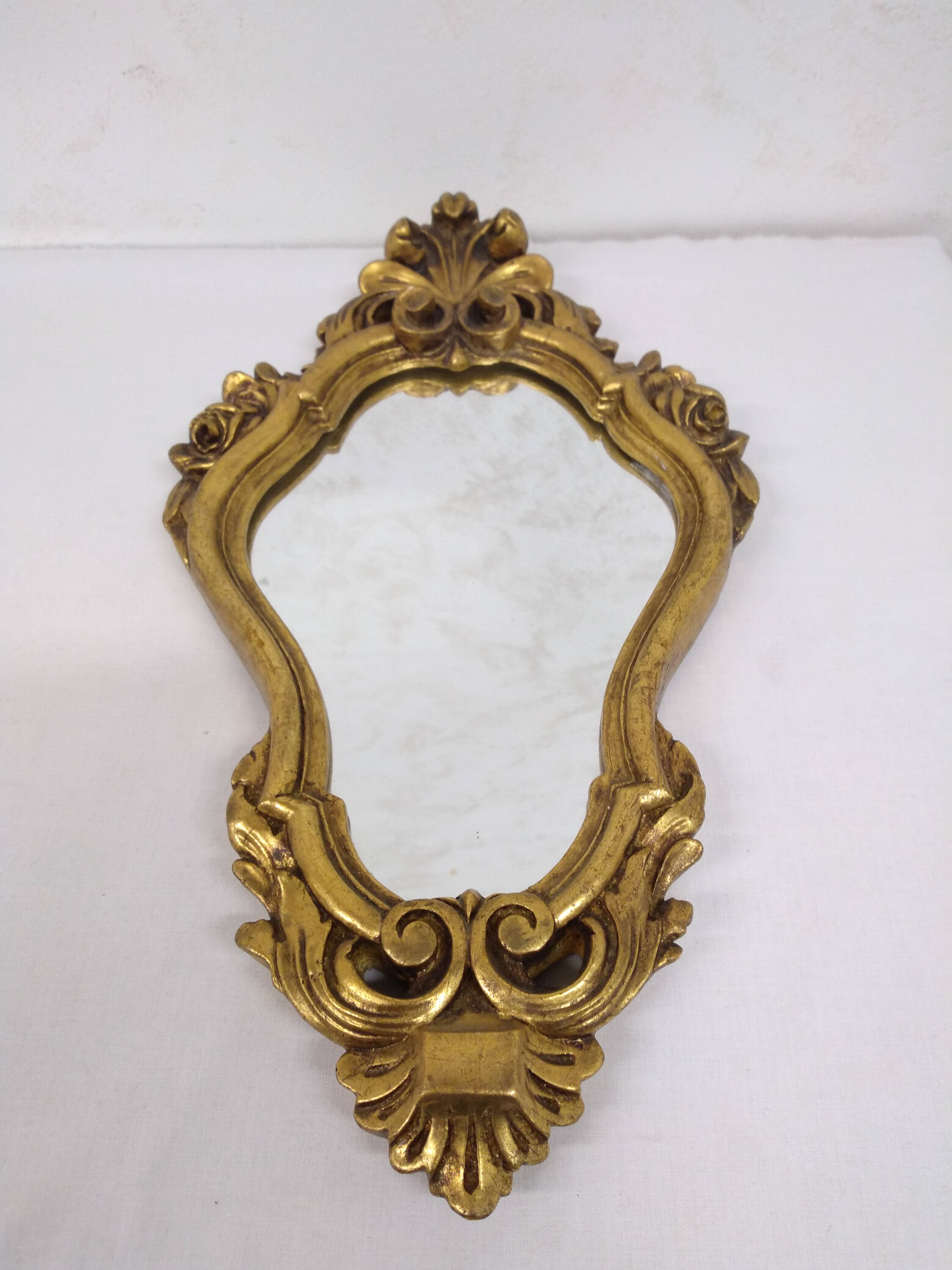 Gold stucco rocaille style mirror