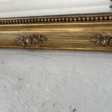 Miroir de style Louis XVI en bois et stuc doré XIX siècle