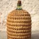 Lady Jeanne bottle, green glass bottle dressed in straw and wicker weaving, jar, vintage decor.
