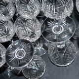 Baccarat set of 35 crystal glasses + 2 flower model carafes 9157 from 1907