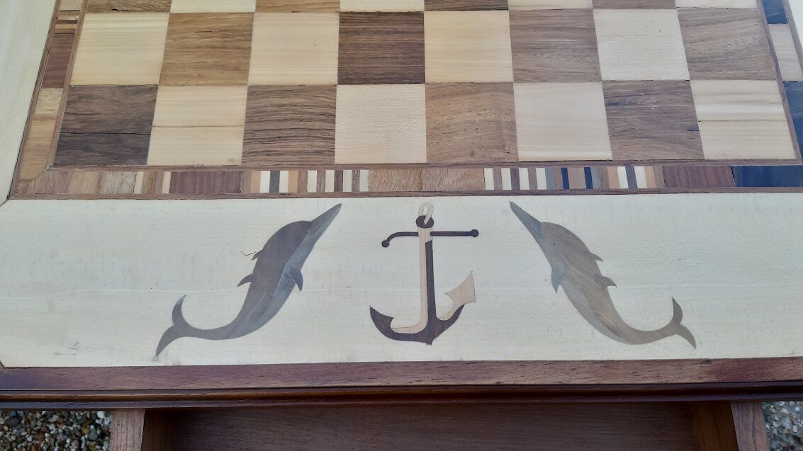 Table at play marquetry