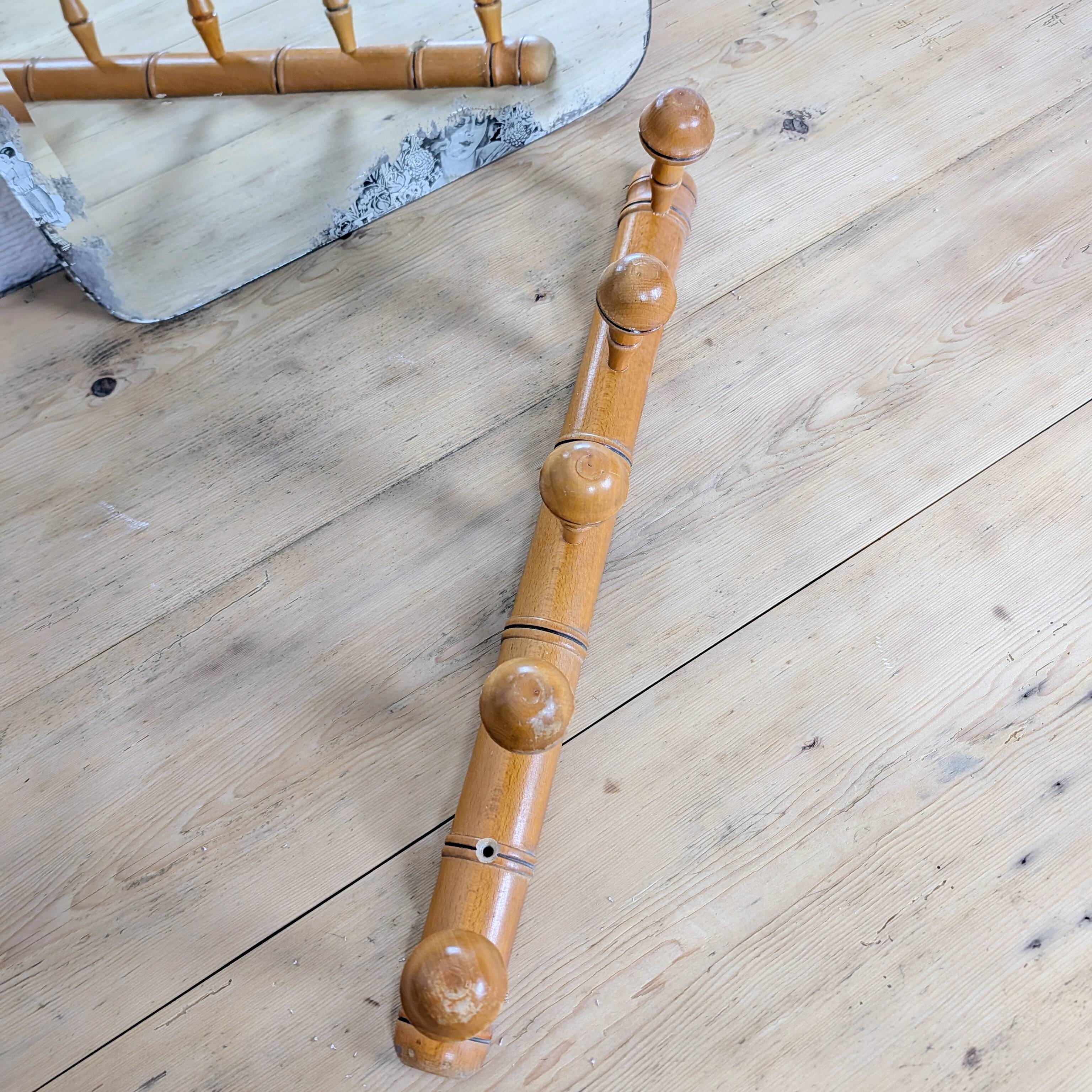 Turned wooden coat rack