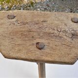 Old wooden milking stool