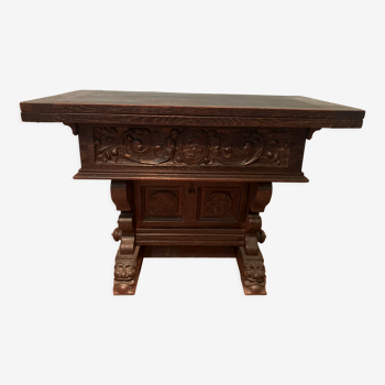 Console table in carved oak XX century