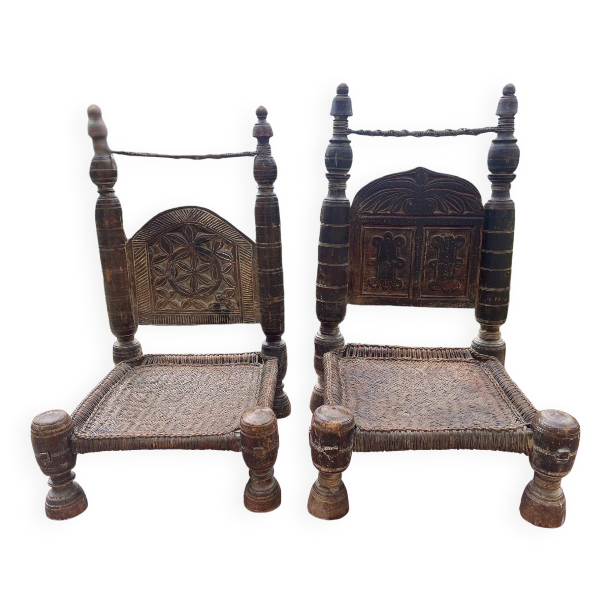 Pair of antique traditional Indian carved wooden chairs