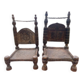 Pair of antique traditional Indian carved wooden chairs