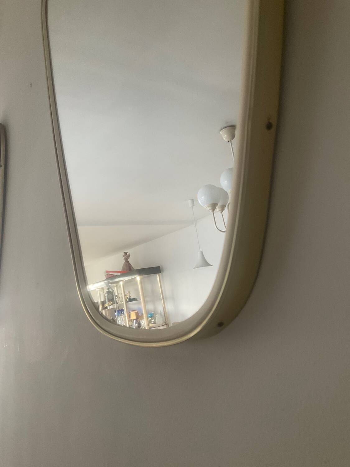 Asymmetrical free-form mirror from the 70s