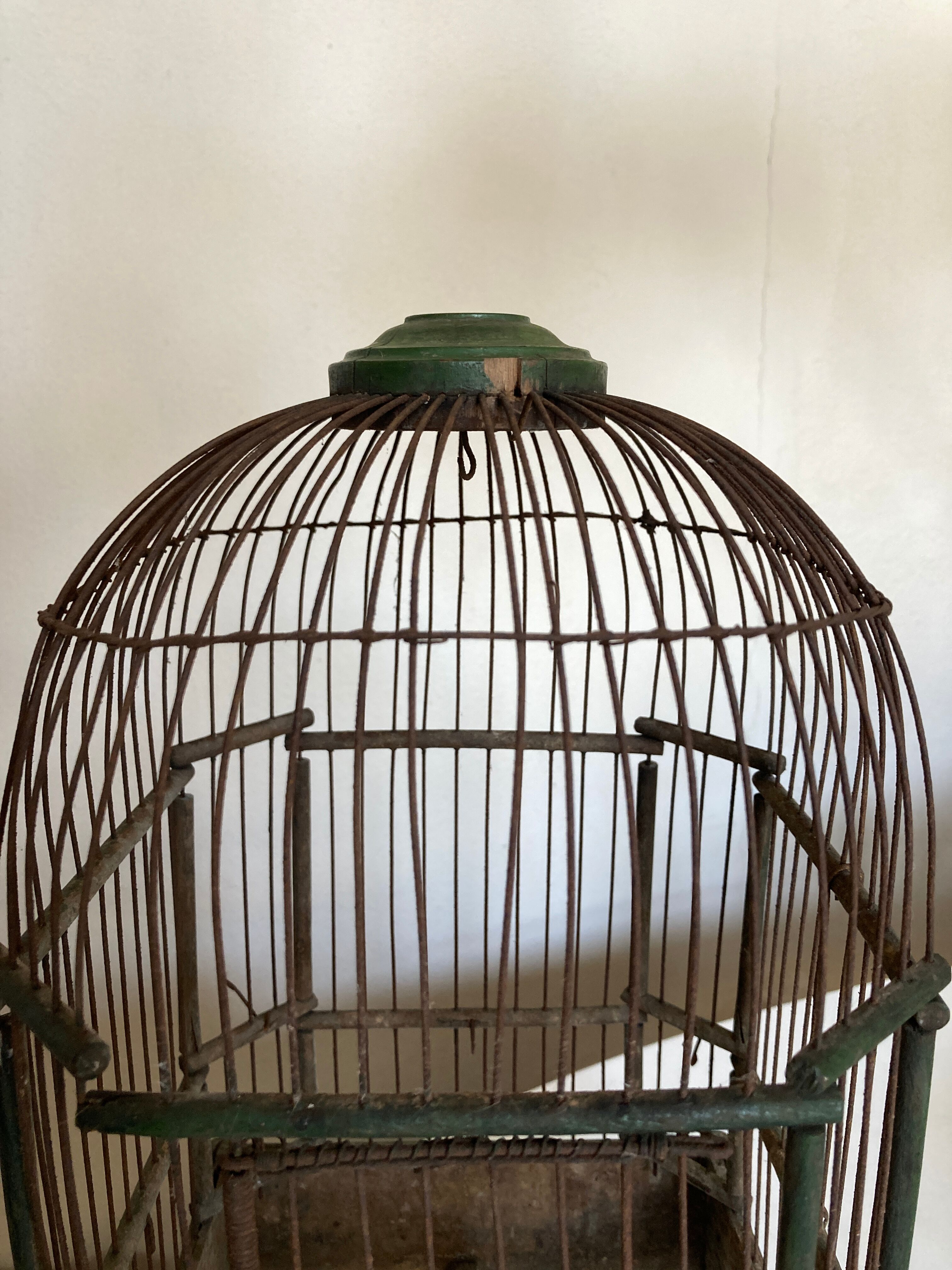 Octagonal bird cage made of wood and wire around 1920