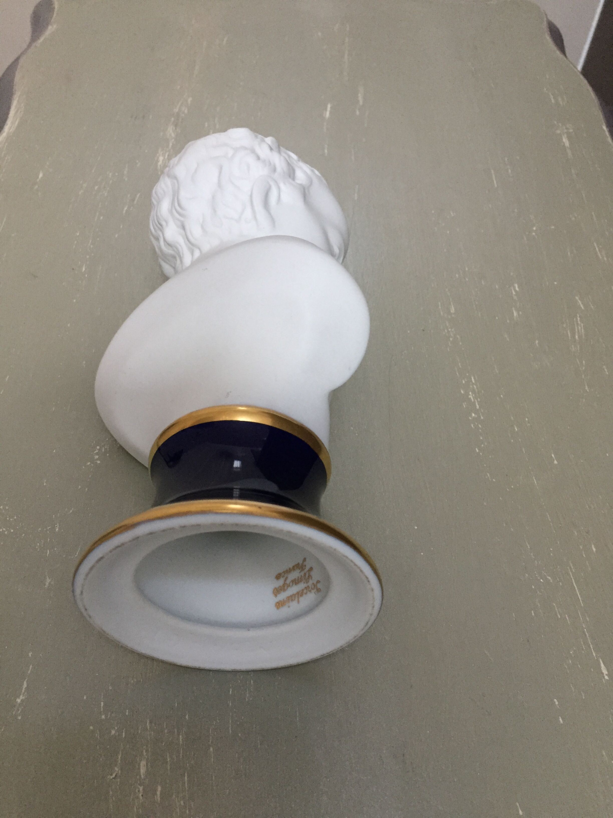 Child bust in limoges porcelain