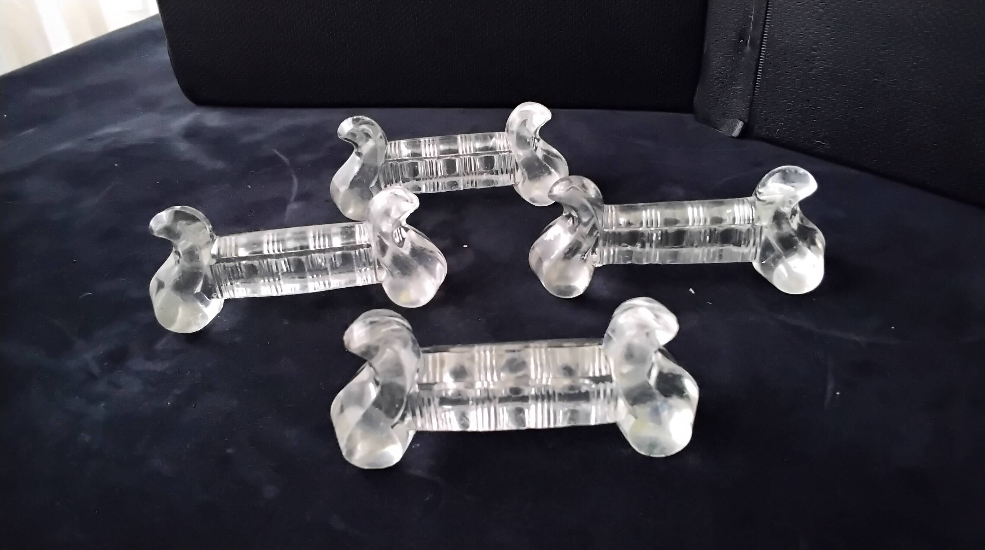 4 large pressed moulded glass knife rests