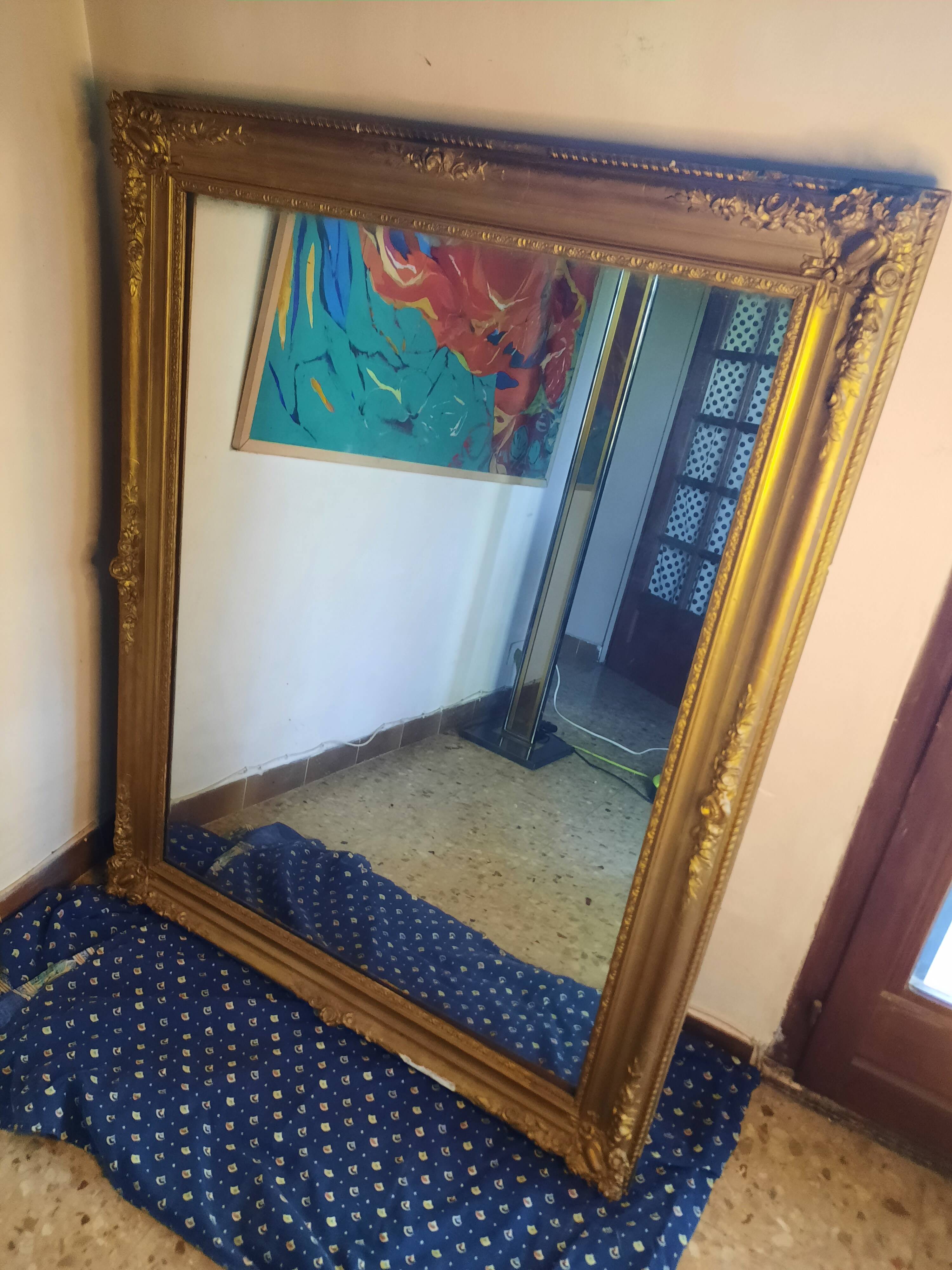Very large gold mirror