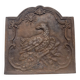 Ancienne plaque de cheminée en fonte ,décor aigle et soleil, 47 × 47 cm