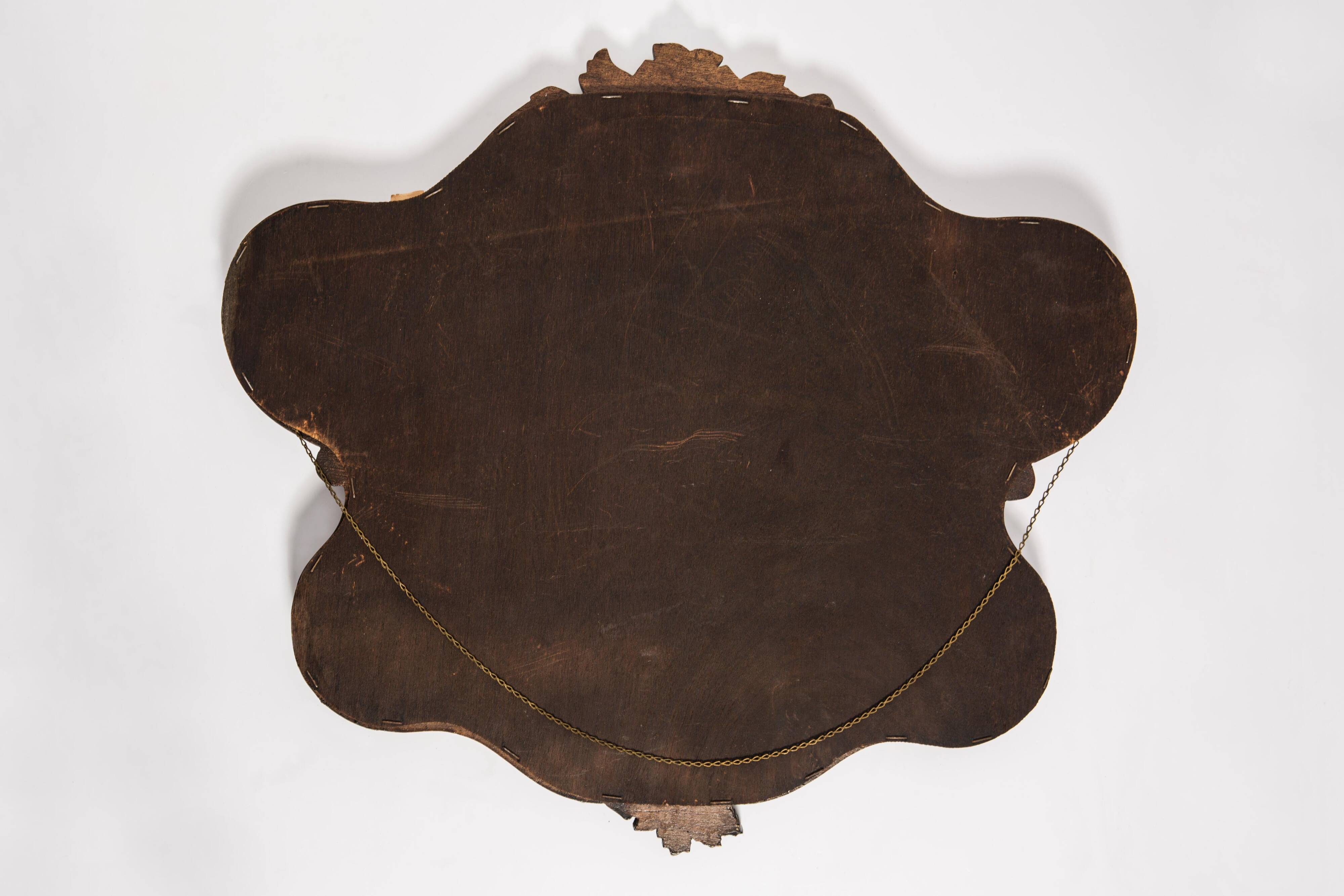 Medium vintage mirror in dark brown wood, Europe, 1960.