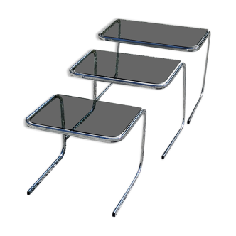 Set of 3 pull-out tables from the 70s in smoked glass with chrome base