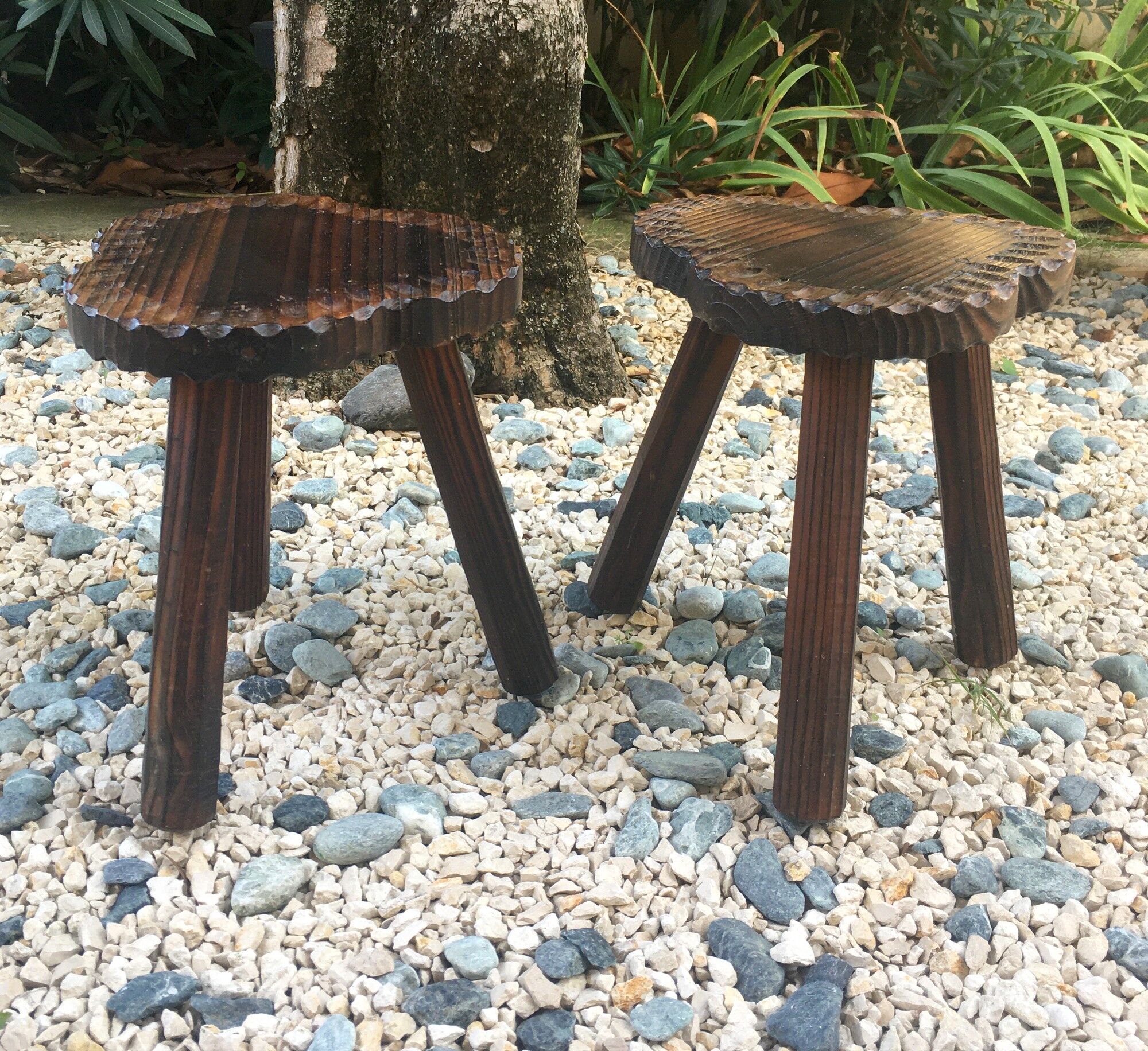 2 vintage tripod stools in solid wood