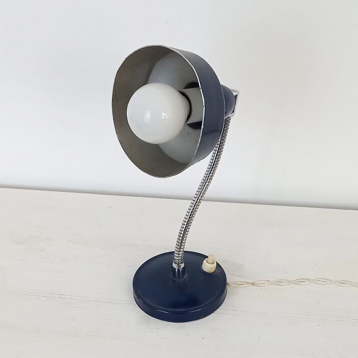 Flexible bedside lamp in blue lacquered sheet metal and stainless steel, edition of the 70s.