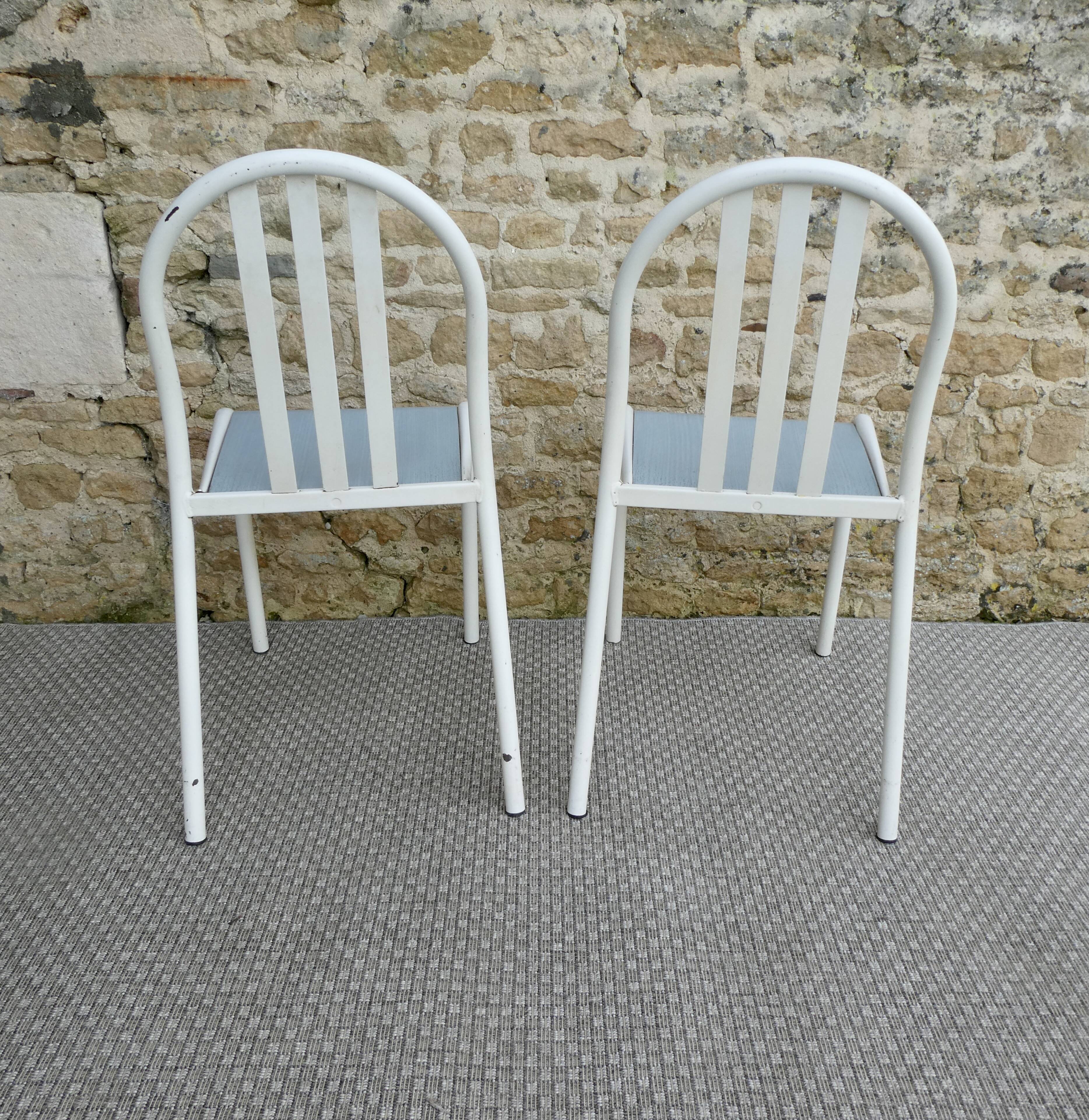 Set of 4 chairs by Robert Mallet-Stevens, 1960s.