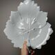 Celadon porcelain vine leaf dish by L. Michelaud, Limoges, 1930-50.