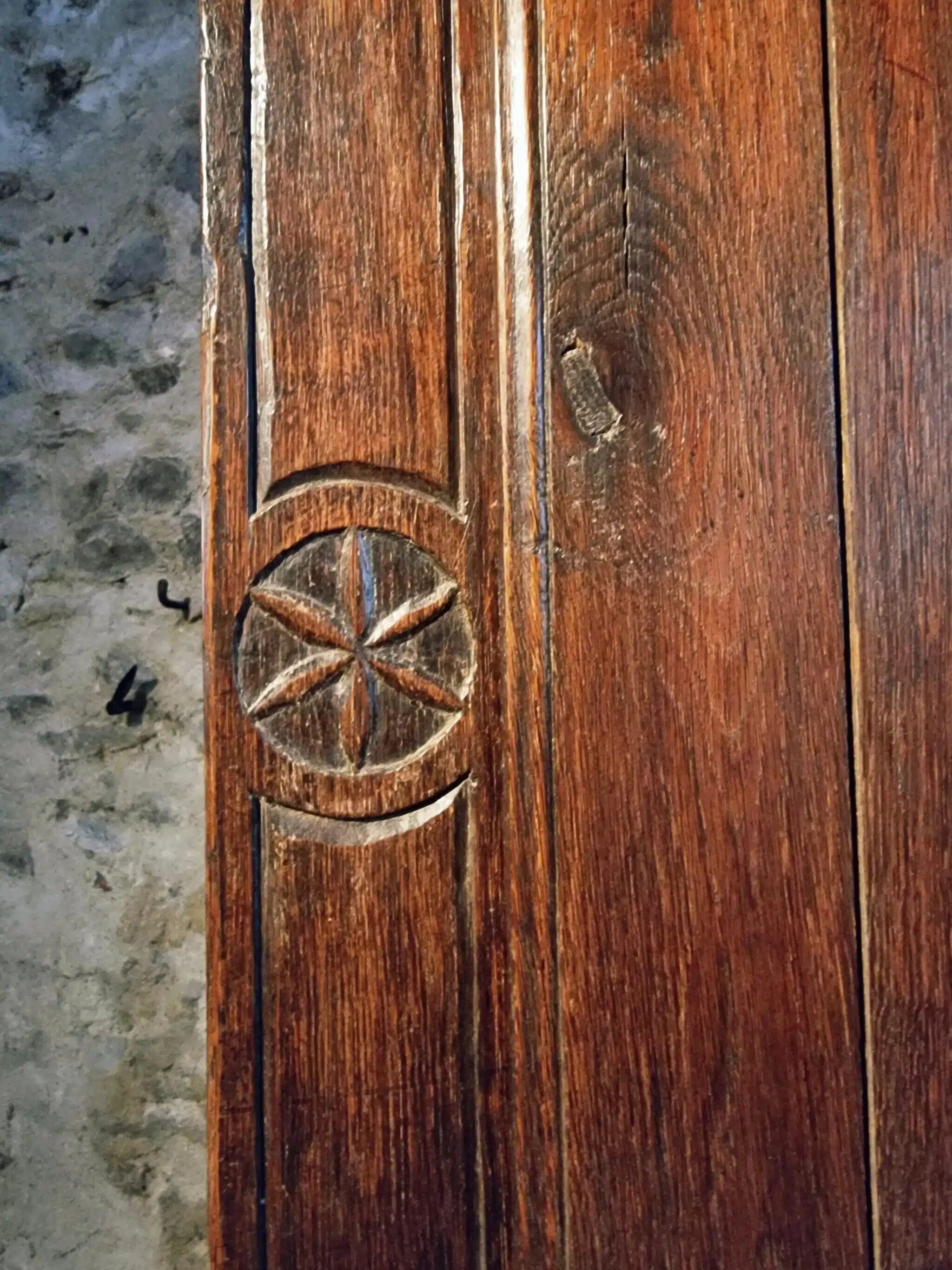 French oak armoire, late 17th - early 18th century, Louis XIV provincial style with hand-carved rosettes
