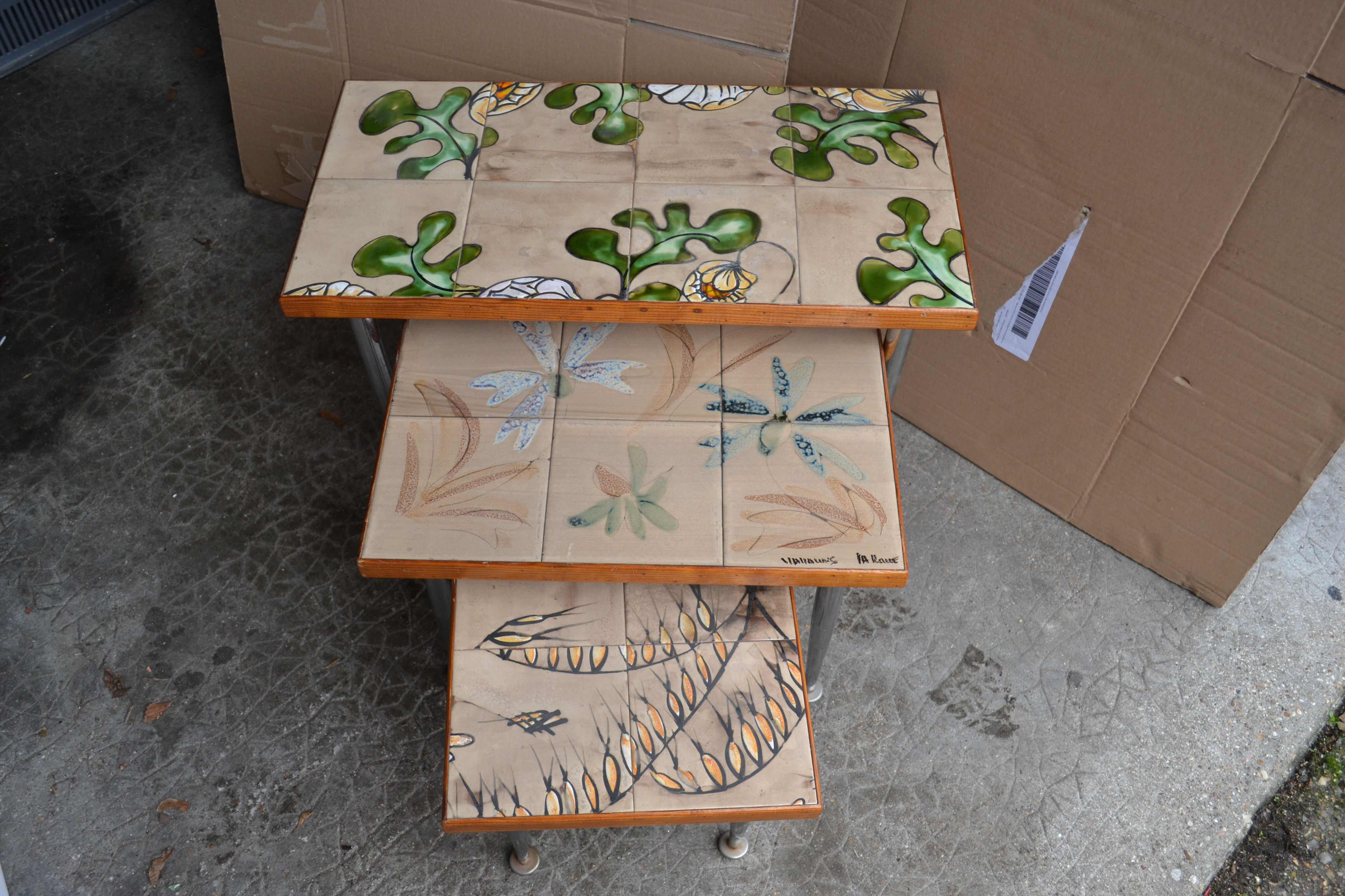 pull-out tables Vallauris, signed 'the wheel' ceramic, chrome foot