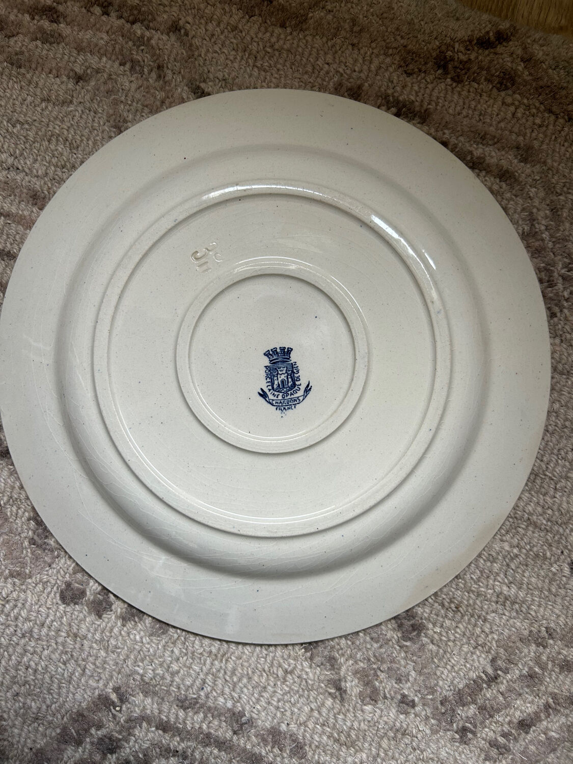 Round plate, iron earth, Gien Thistles