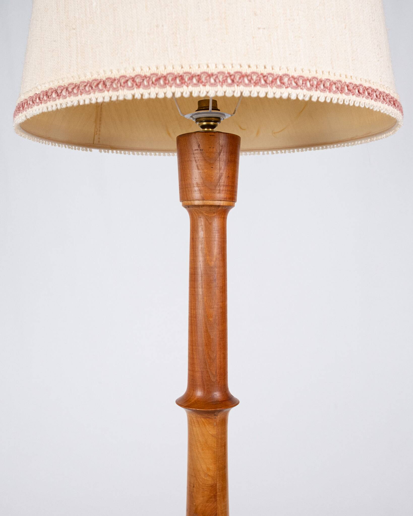 Pair of turned wooden floor lamps in Art Deco style, France, mid-20th century.