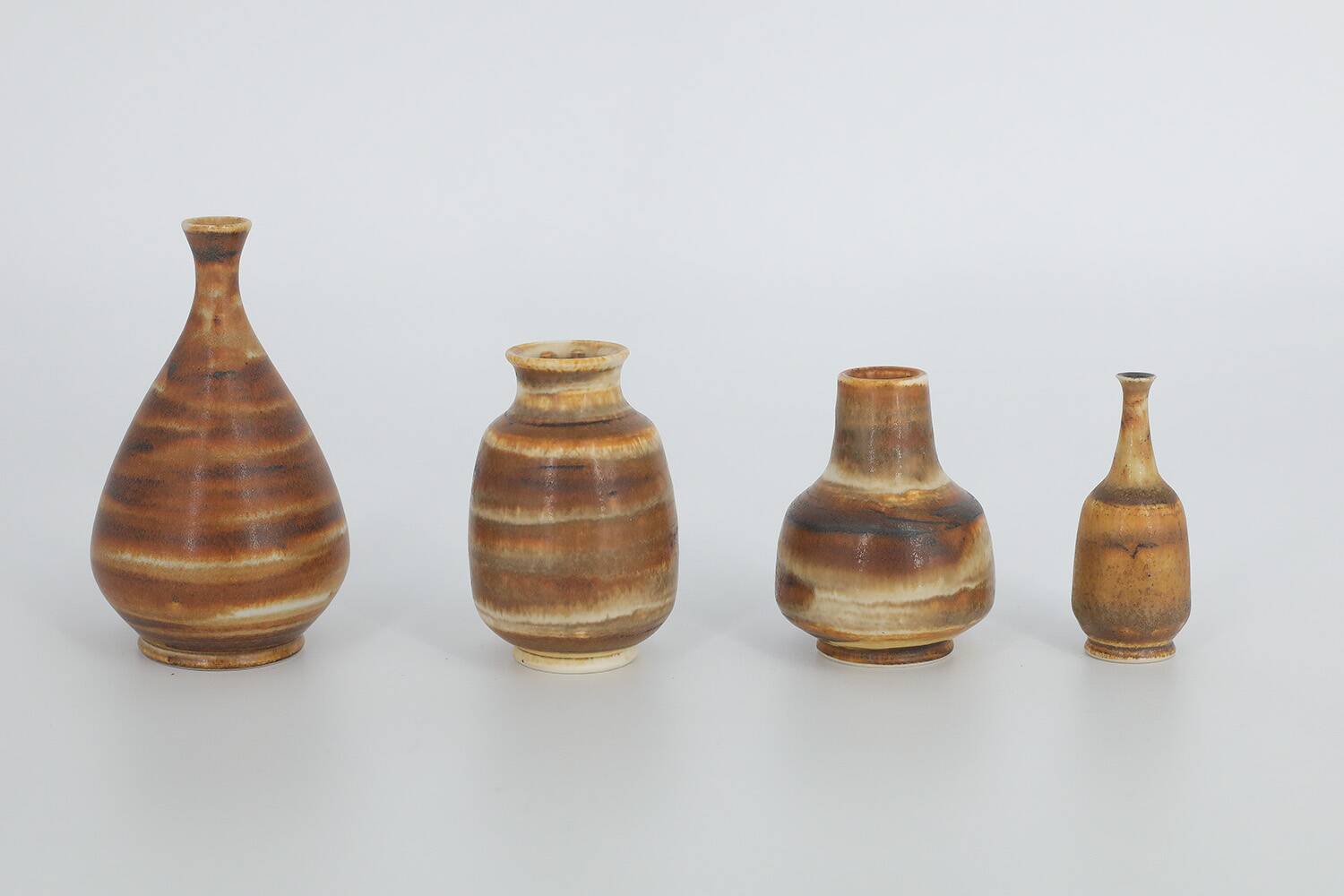 Small Mid-Century Scandinavian Modern Collectible Honey Stoneware Vase by Gunnar Borg, Set of 4
