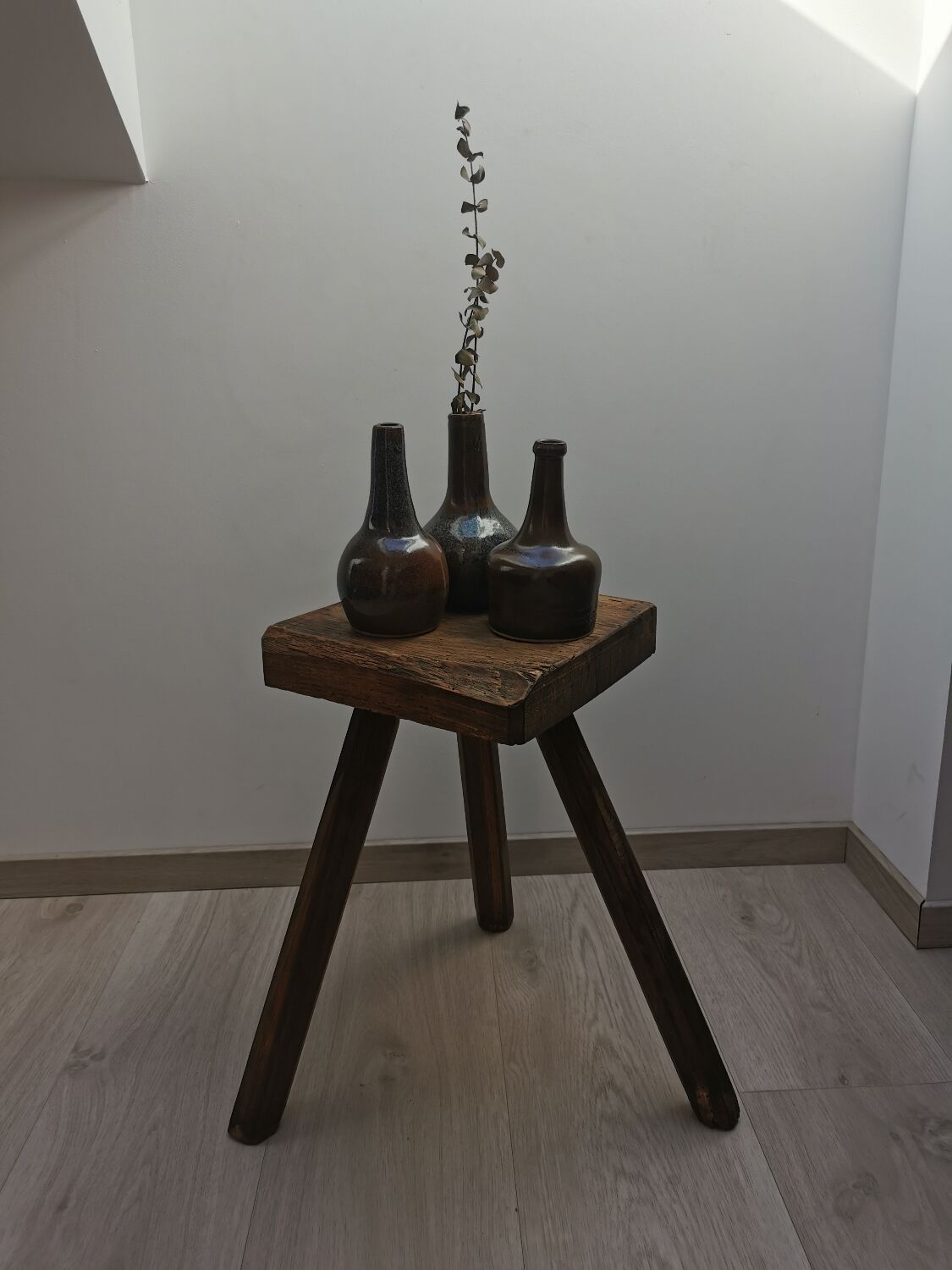 Old wooden stool tripods