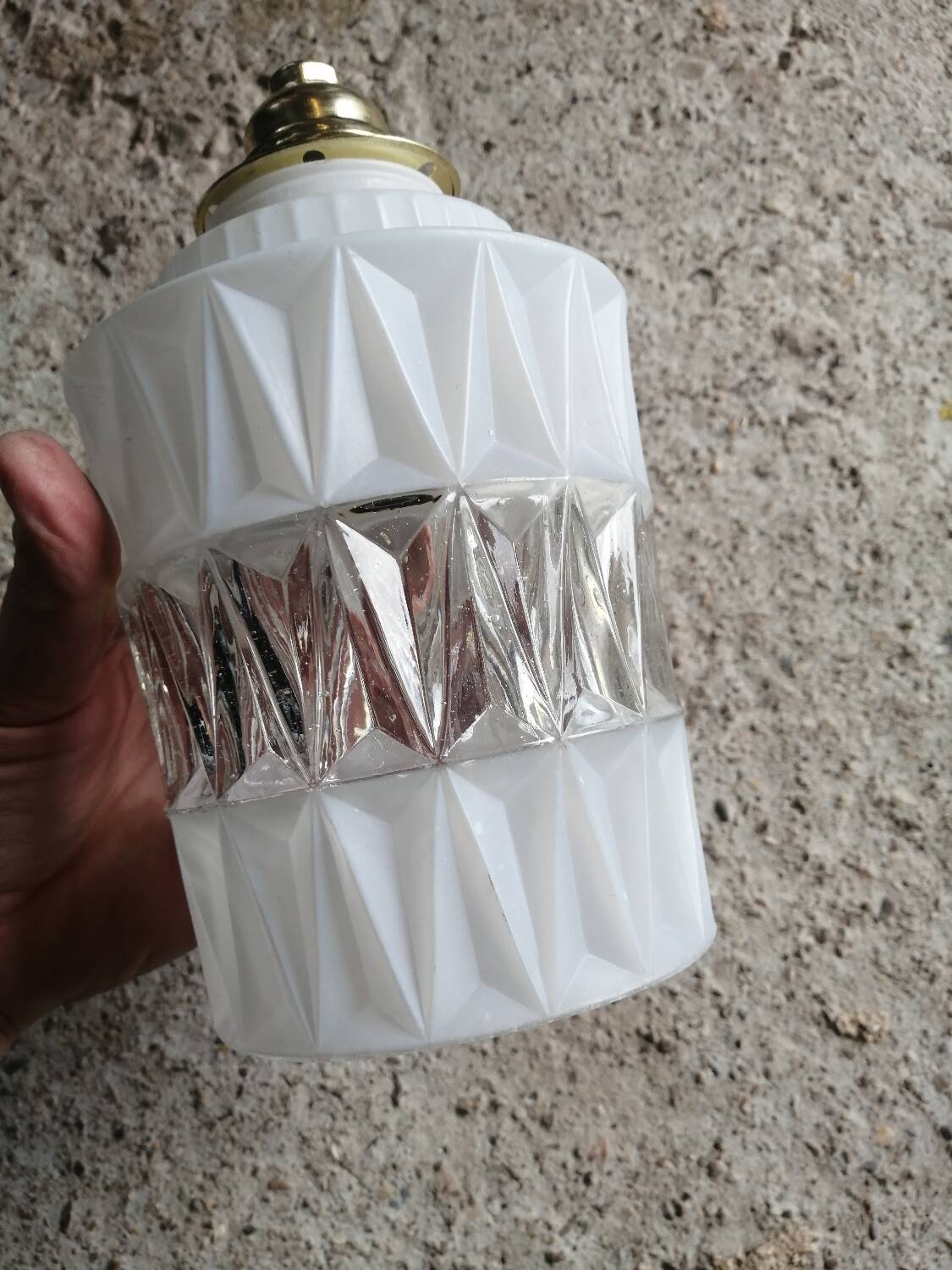 Vintage globe pendant light in molded glass.