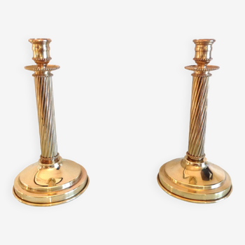Pair of empire style brass candlesticks