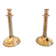 Pair of empire style brass candlesticks