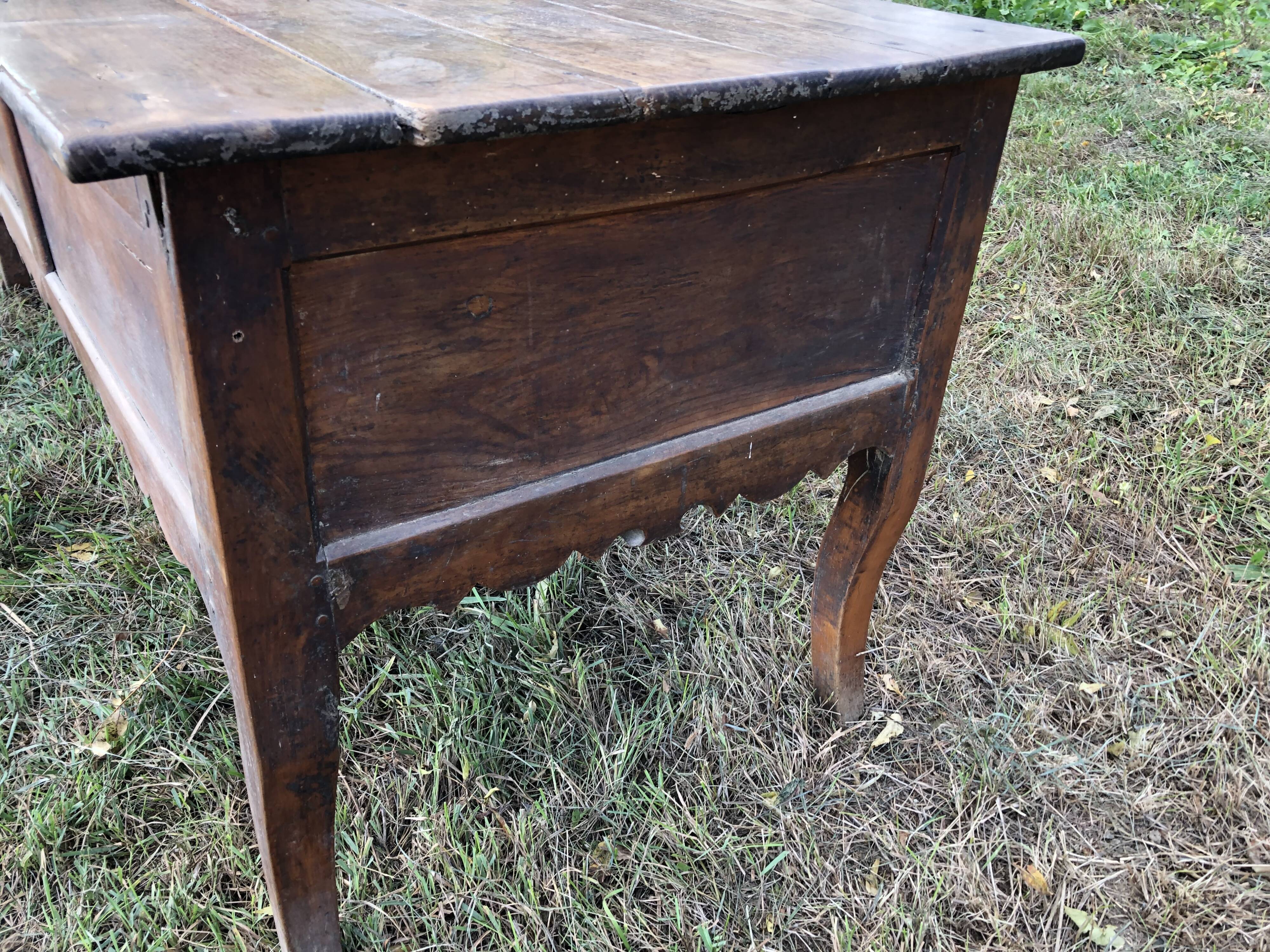 Antique Louis XV paneled table with 3 front drawers in solid cherry wood