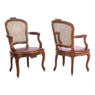 Pair of “cabriolet” armchairs in walnut and canework. Louis XV period. LS5209325