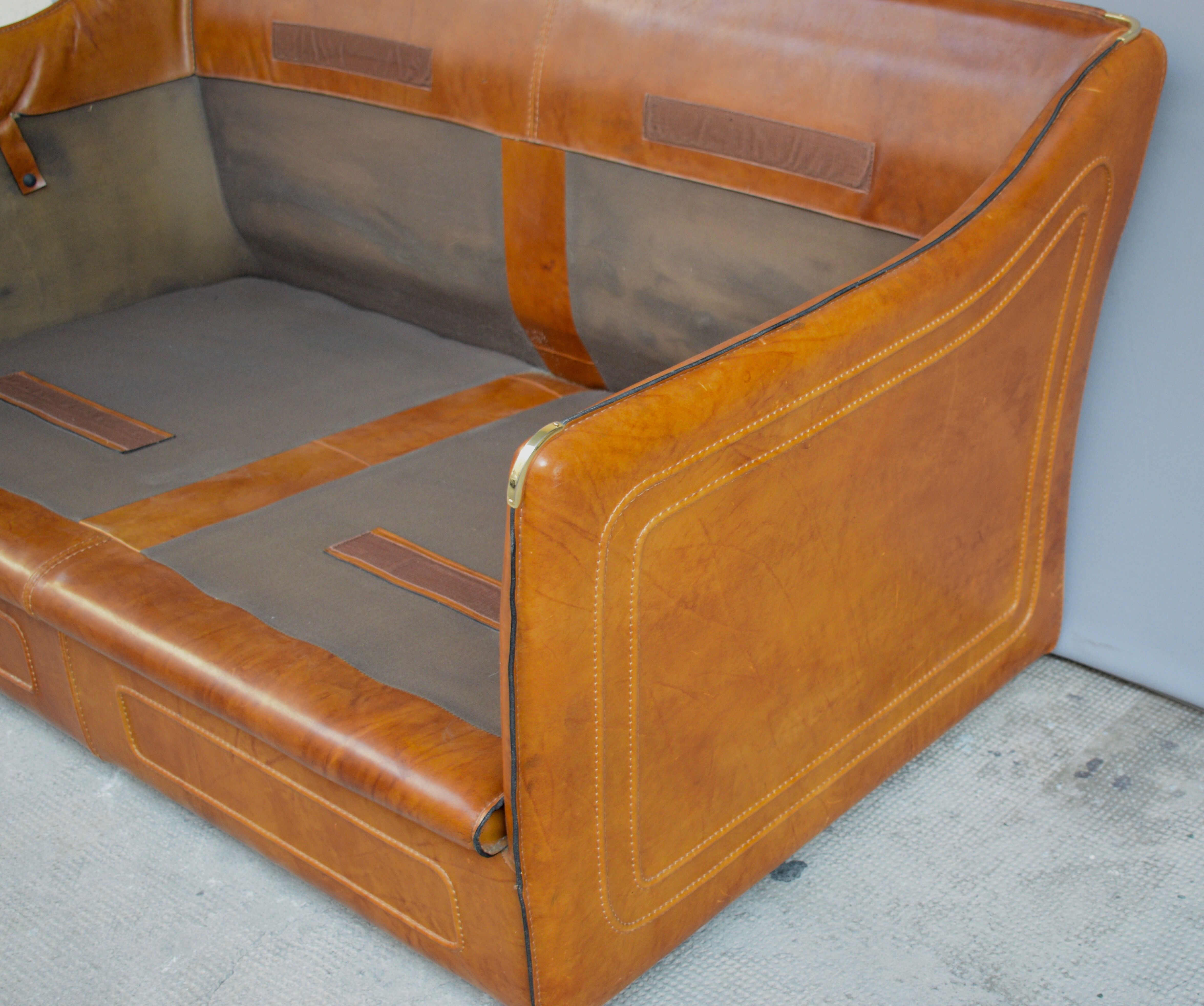 Vintage two-seater leather sofa