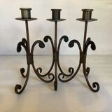 Trio of wrought iron candlesticks