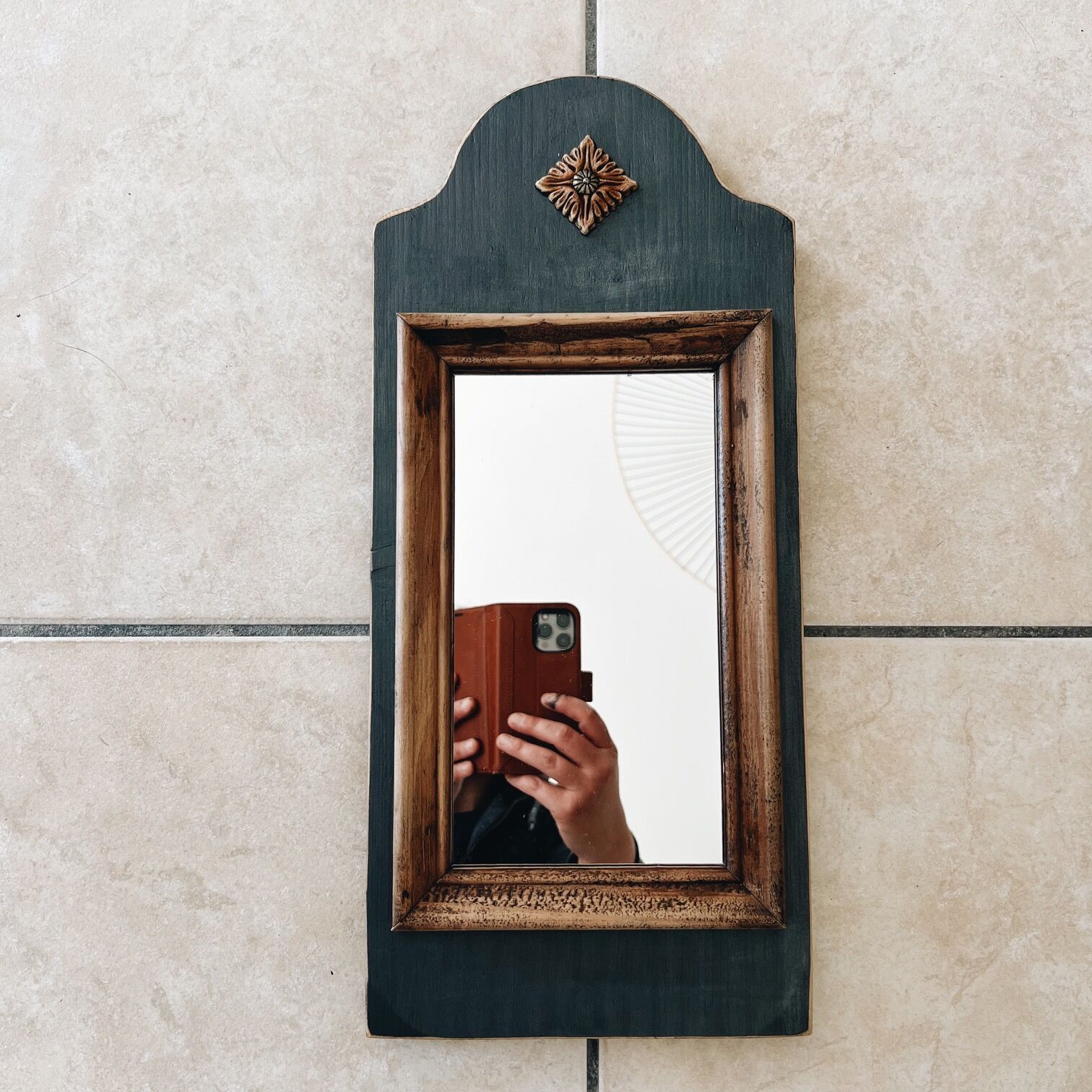 Wooden and black mirror