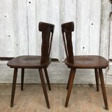 4 wooden chairs with brutalist design