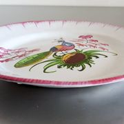 Rare Les Islettes earthenware plate decorated with a peacock. 19th century.