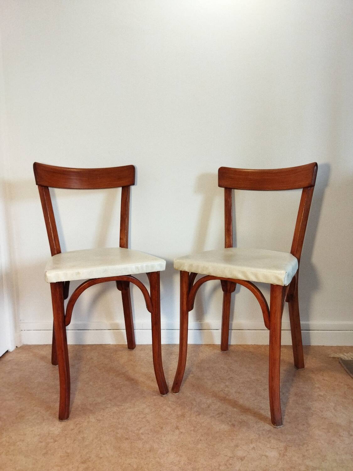 Pair of Baumann bistro chairs