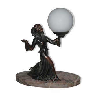 Art deco lamp in regul and marble "woman holding a globe"