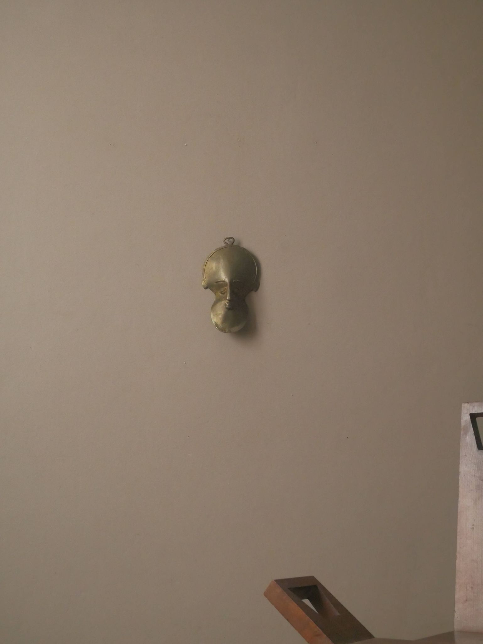 Brass mask wall sculpture tribal decorative object African art handmade vintage