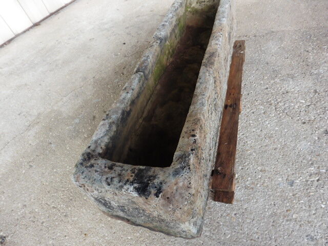 Old natural stone trough