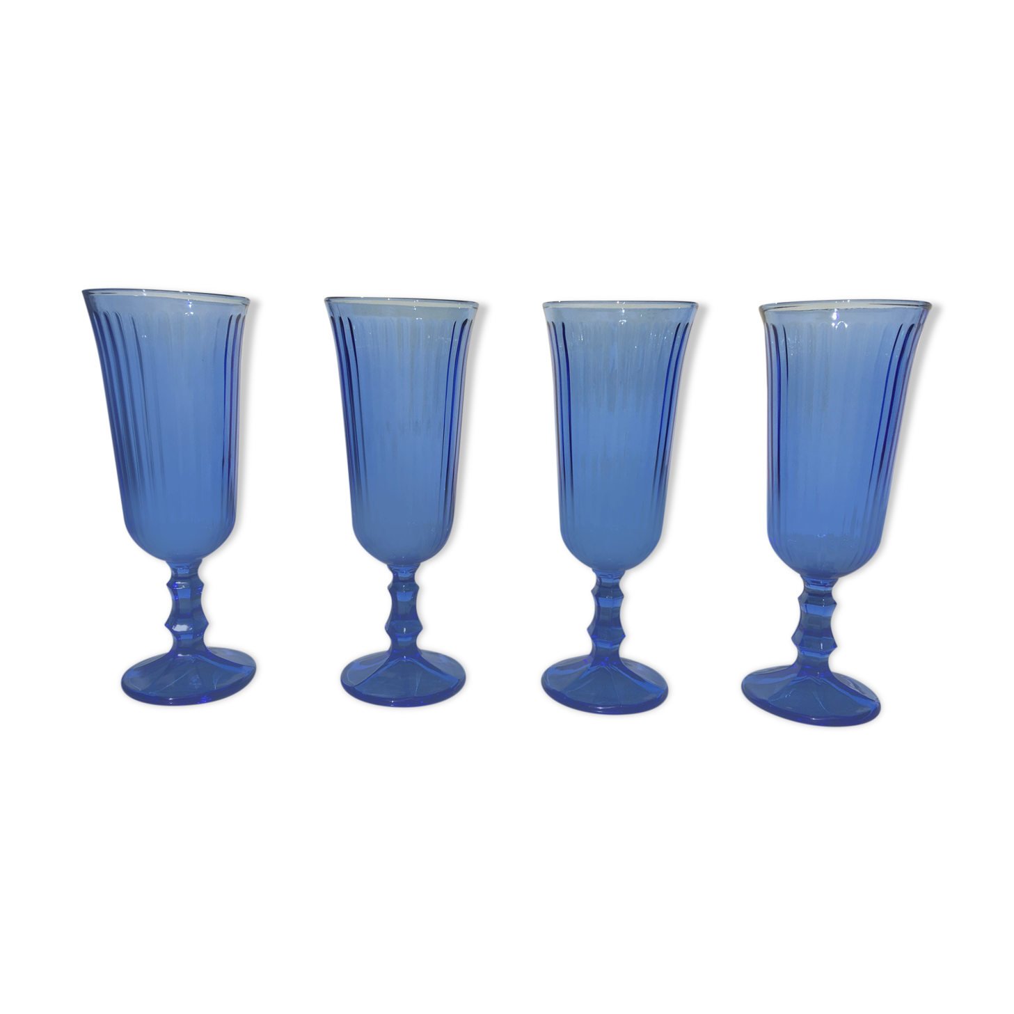 Champagne flutes in blue glass