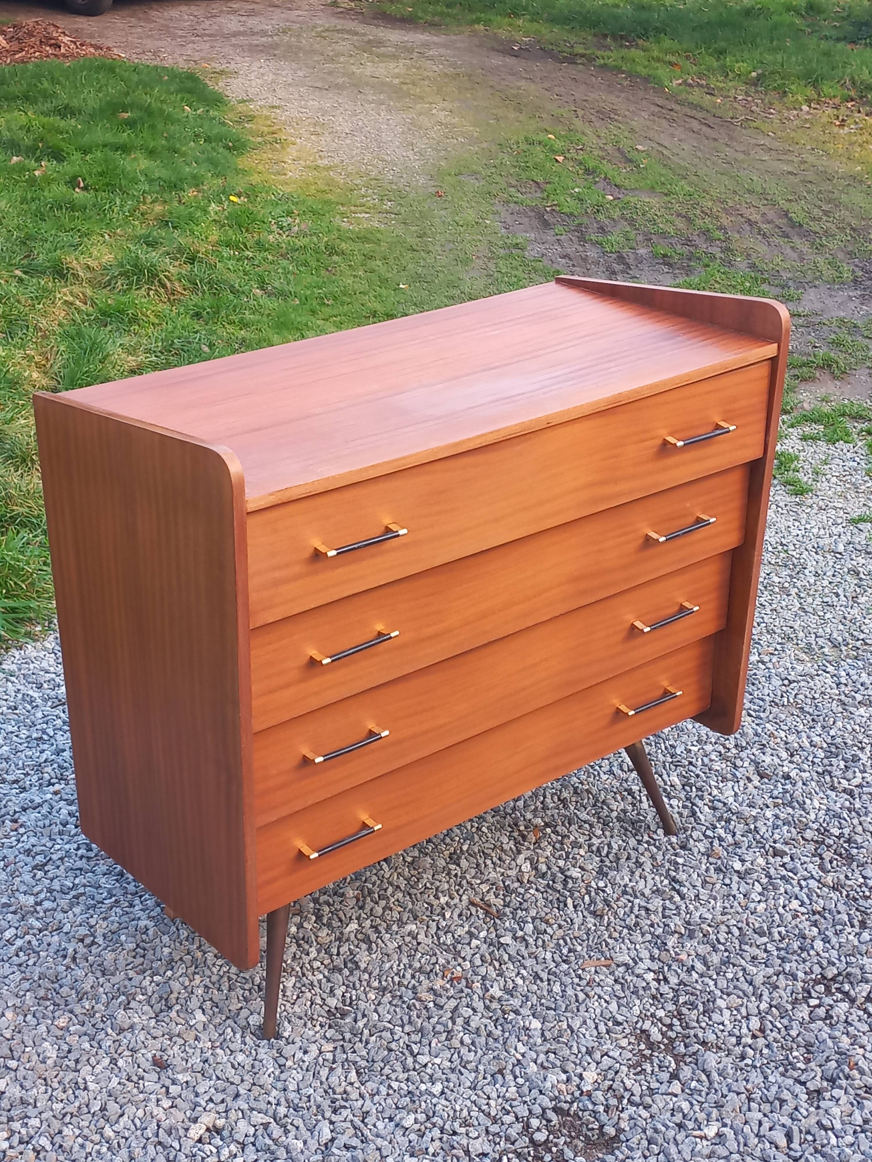 Vintage mahogany commode with metal tapered legs, 4 drawers, 1950s.