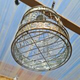 Round weathered iron birdcage