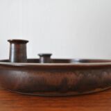 Candle holder made of stoneware with a harefur glaze
