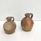Set of two small sandstone pitchers