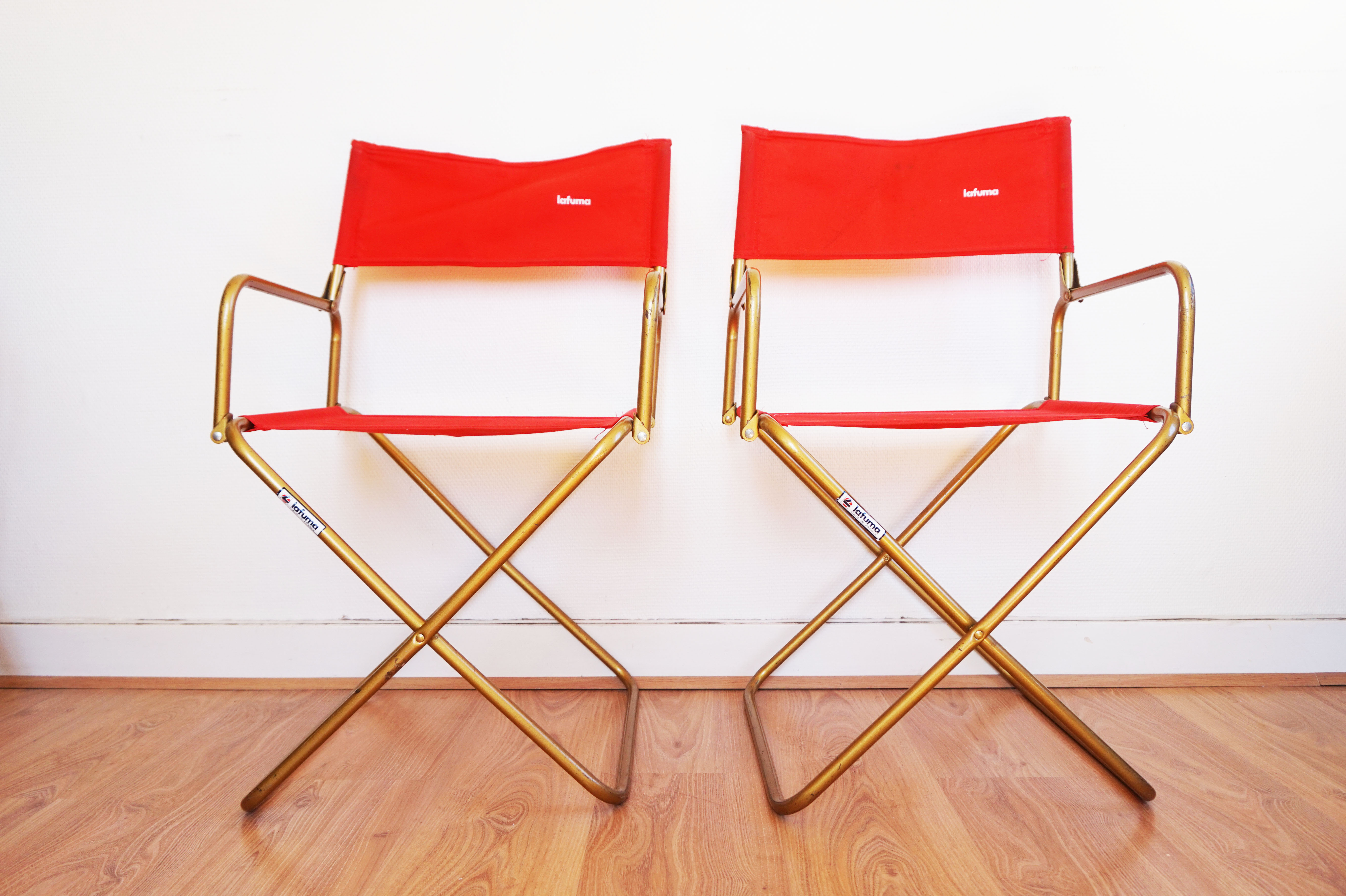 Red vintage pair of lafuma folding chairs